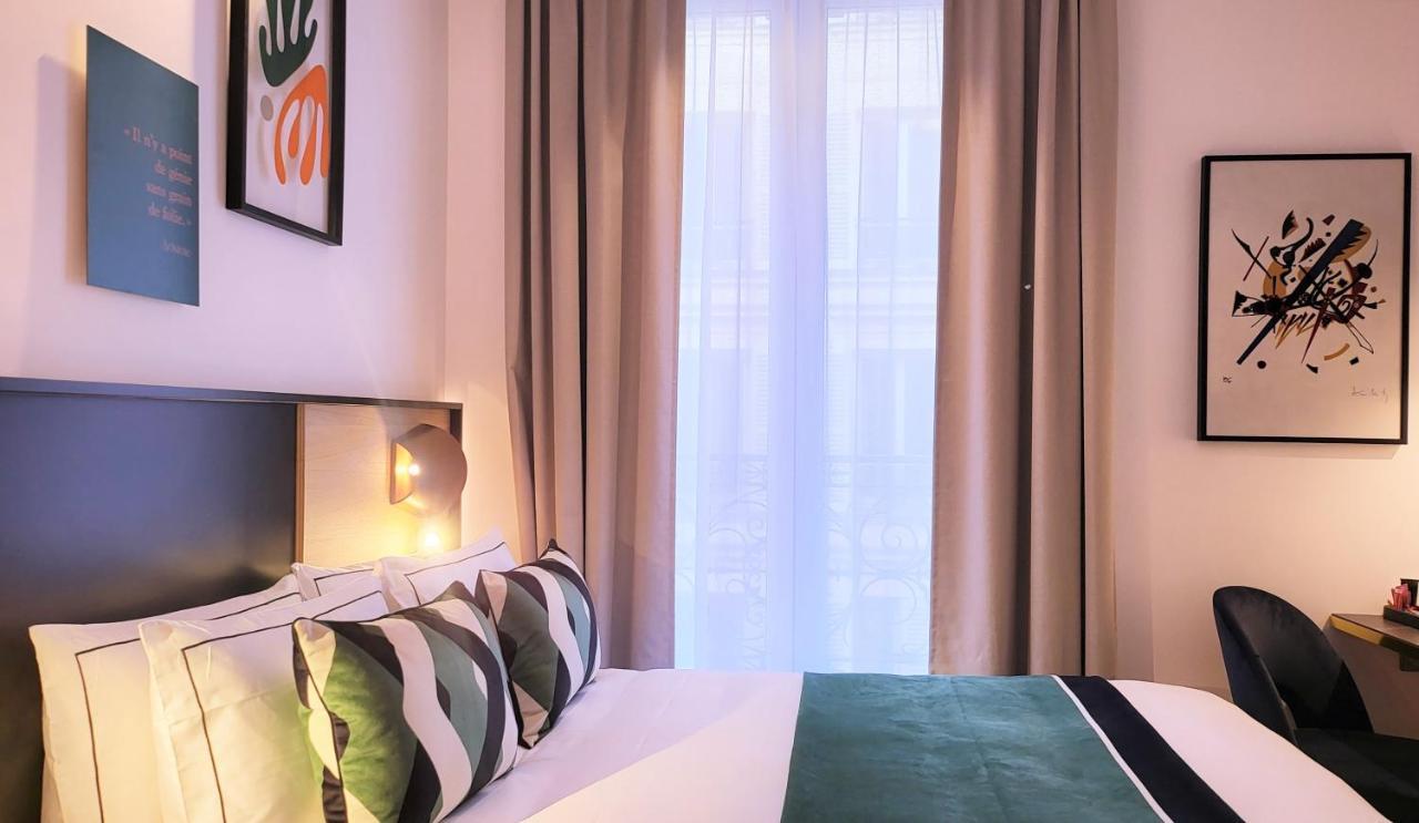 สตาร์ ช็องเซลิเซ่ Hotel ปารีส ภายนอก รูปภาพ